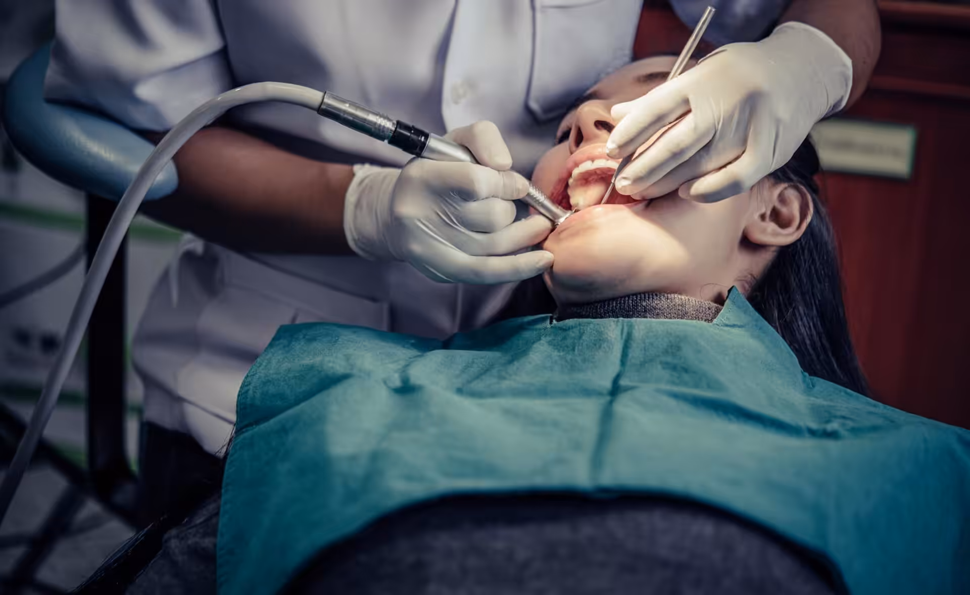 dentists-treat-patients-teeth